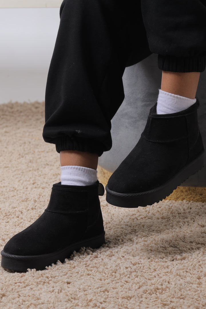 Cozy Ankle Boots on Soft Carpet - Black