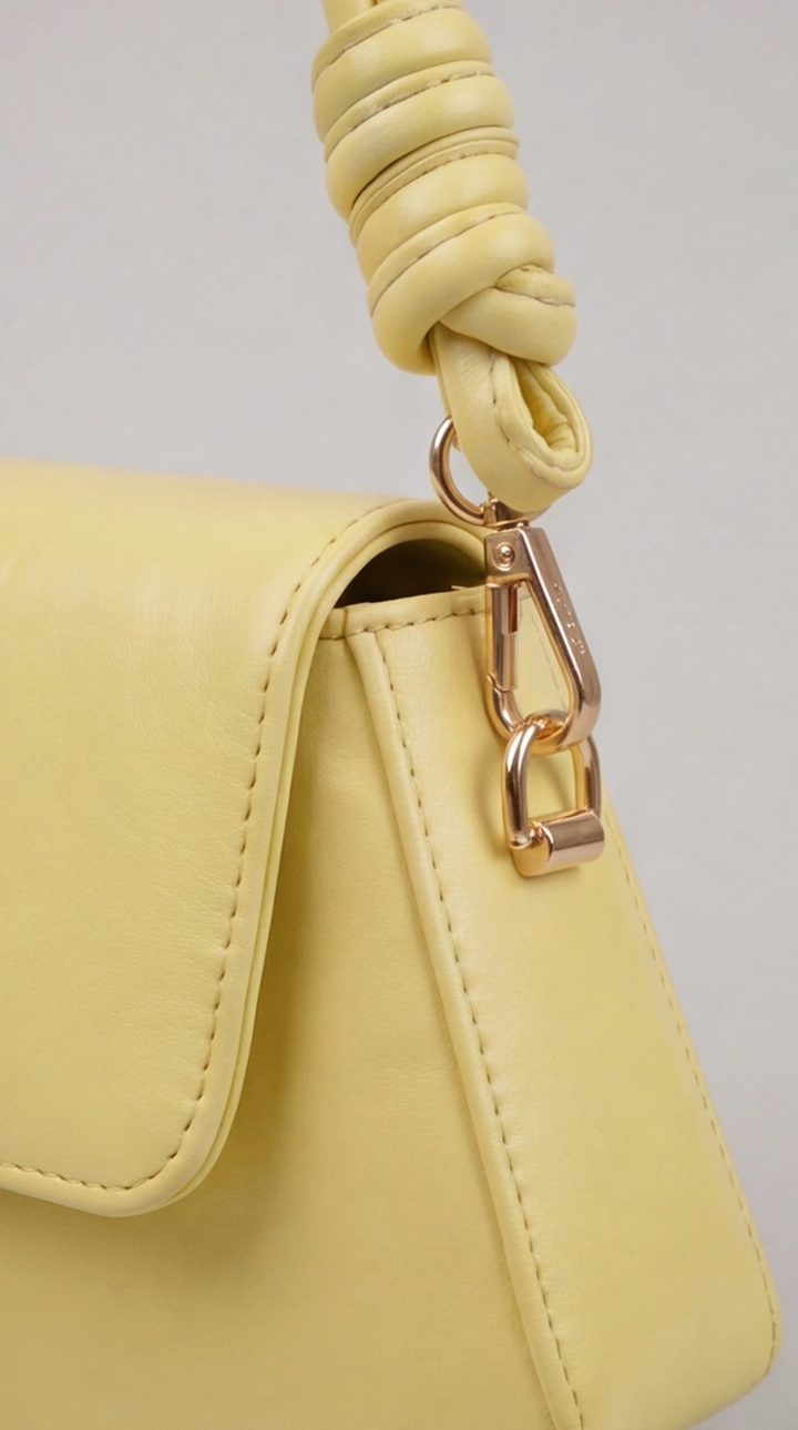 The Crescent Knot Bag - Light Pastel yellow