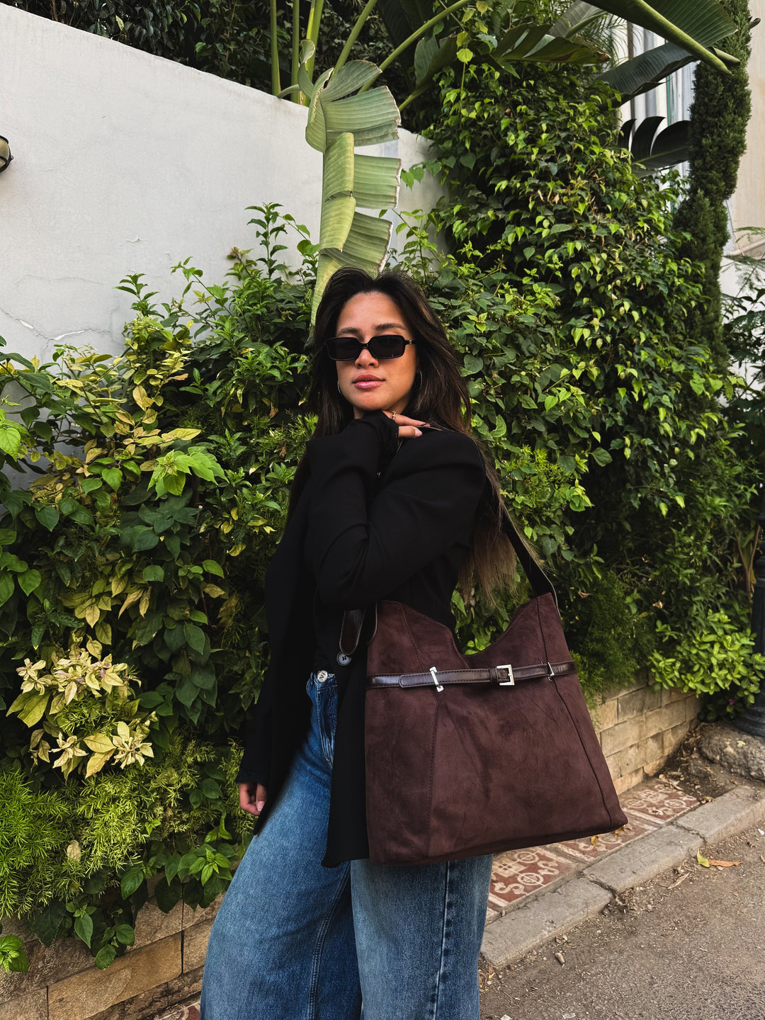 Brown belted slouch shoulder bag faux suede – worn on model (3)