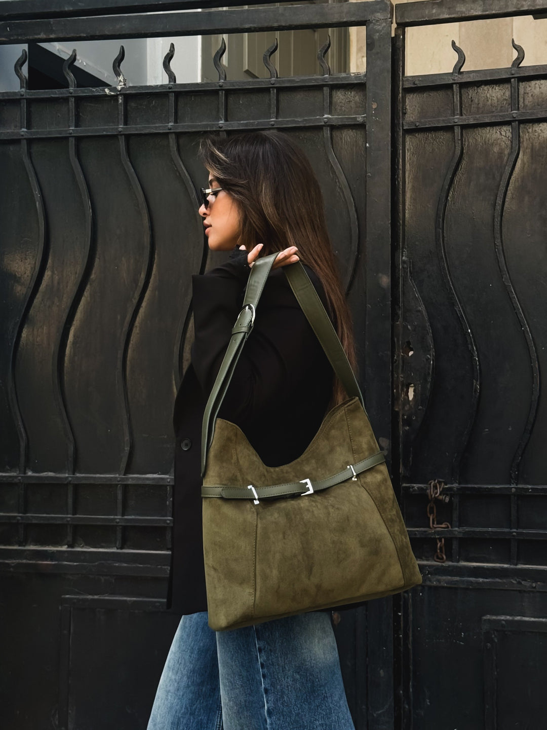 Olive belted slouch shoulder bag faux suede – worn on model (5)