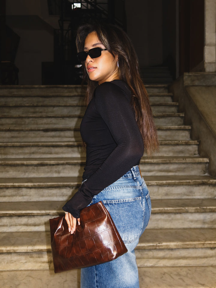 Dark Brown croc-embossed ruched clutch faux leather – worn on model (13)