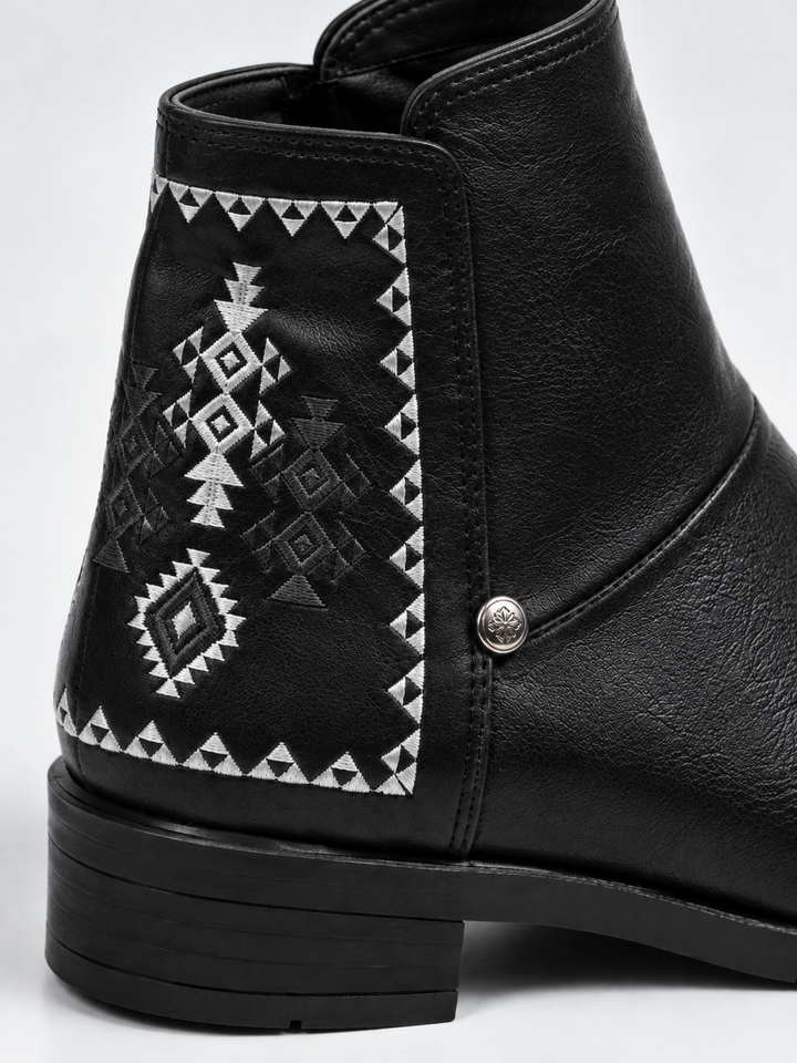 Black embroidered panel ankle boot faux leather – embroidered panel and stud close-up