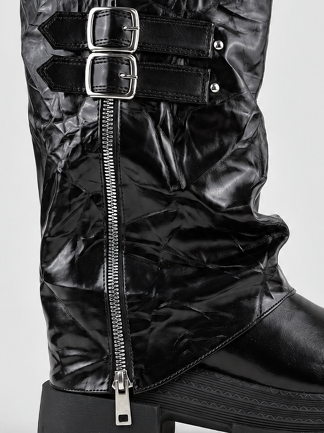 Black crinkled faux leather double-buckle platform boot – side zip and lug sole close-up
