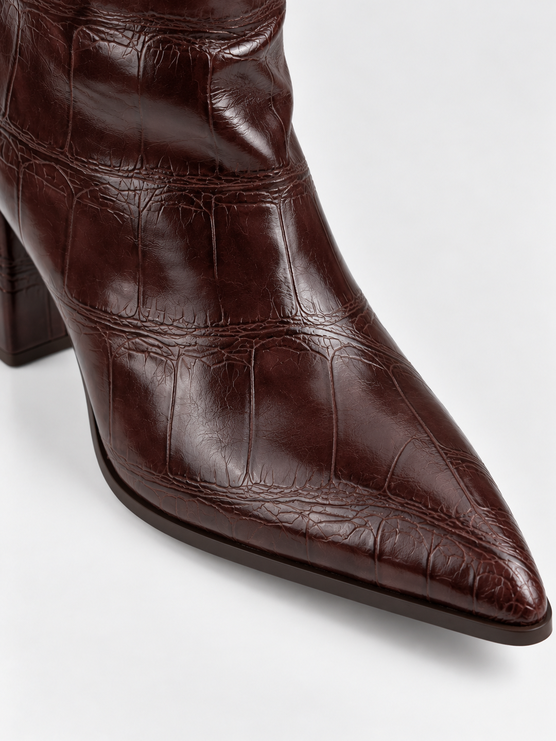 Brown croc-embossed faux leather block heel ankle boot – croc texture and pointed toe close-up