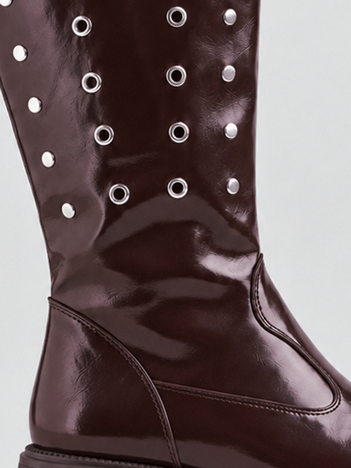 Brown faux leather eyelet platform mid-calf boot – back heel and lug sole close-up