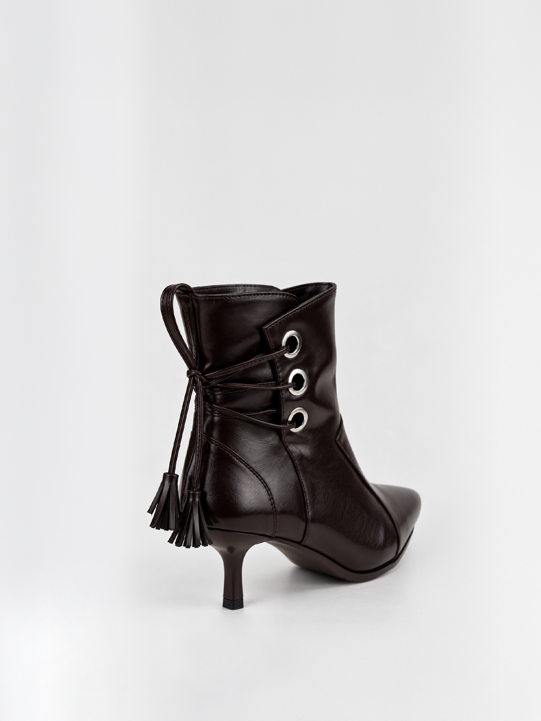 Black faux leather tassel tie kitten heel ankle boot – back three-quarter view