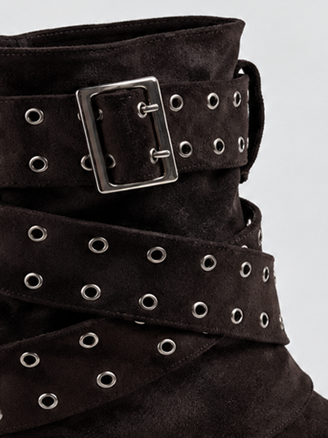 Brown faux suede buckle strap slouch ankle boot – wrapped eyelet strap detail