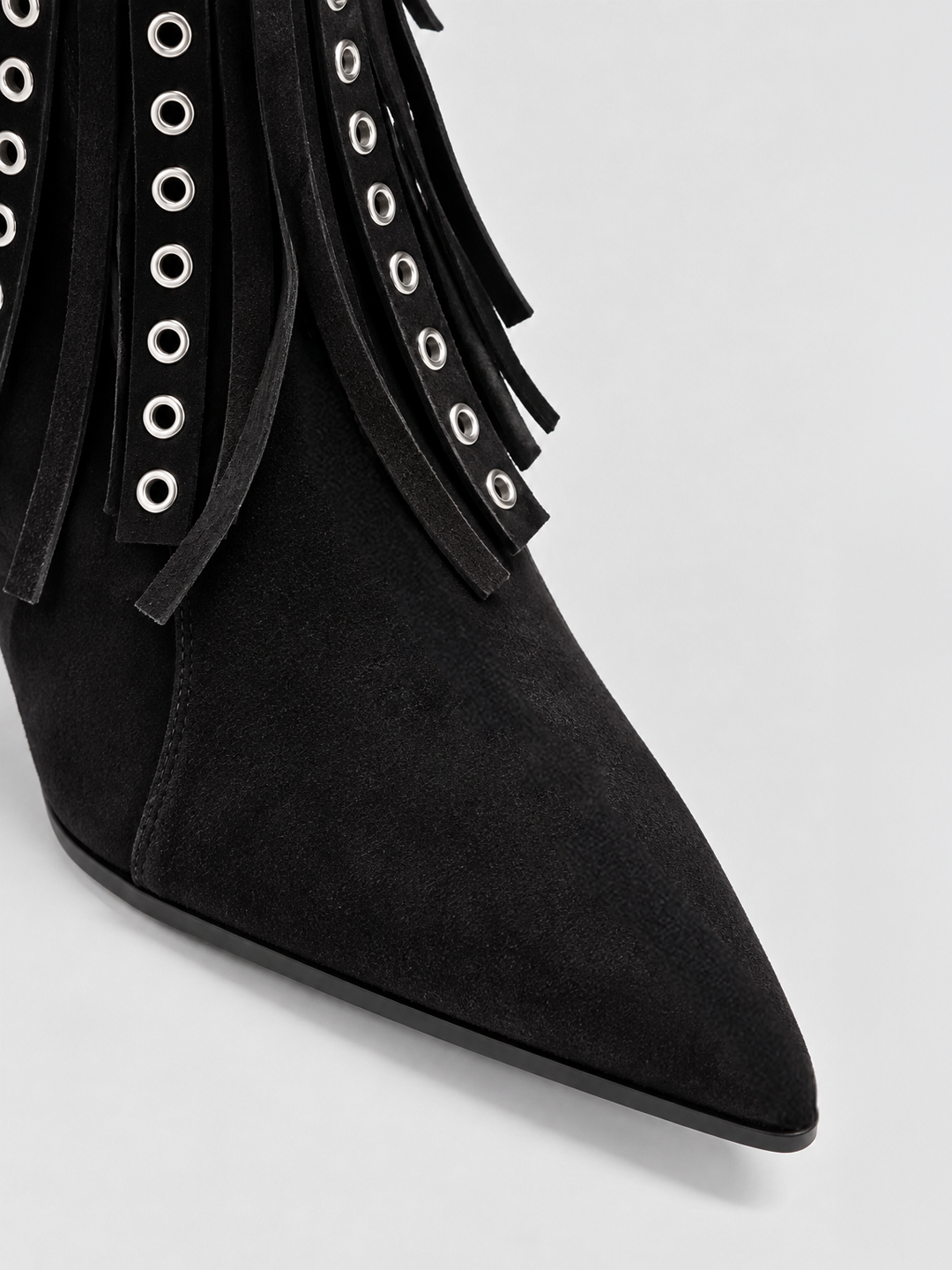 Black faux suede fringe heeled ankle boot – pointed toe close-up