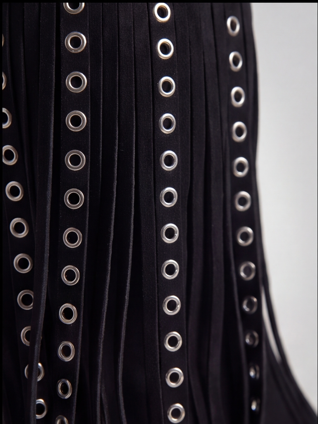 Black faux suede fringe heeled ankle boot – fringe and eyelet detail