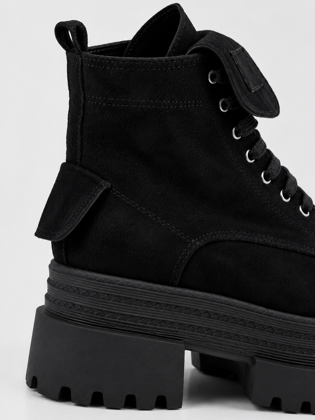 Black faux suede pocket lace-up platform ankle boot – side pocket and lug sole close-up