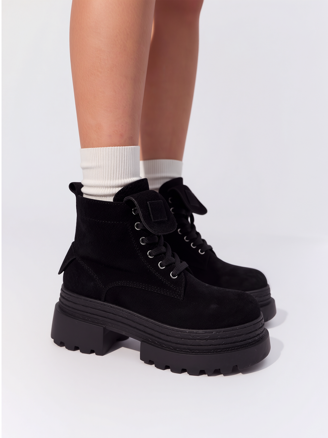 Black pocket lace-up platform ankle boot faux suede – worn on model with white socks, front close-up