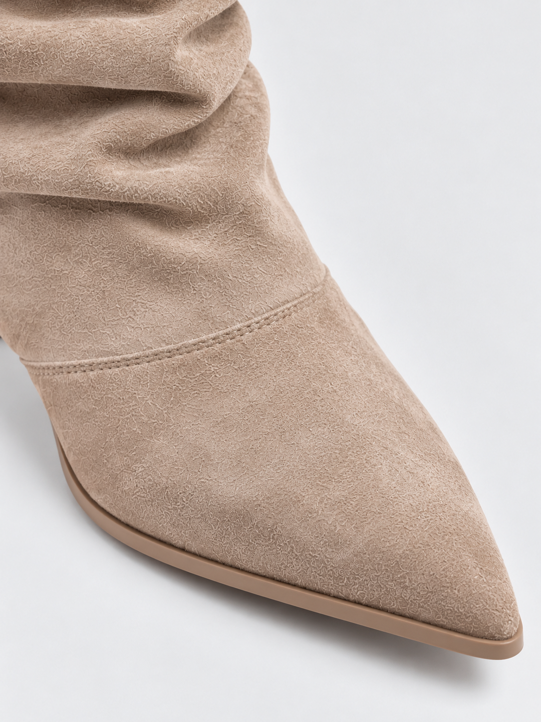 Beige faux suede ruched kitten heel ankle boot – pointed toe close-up
