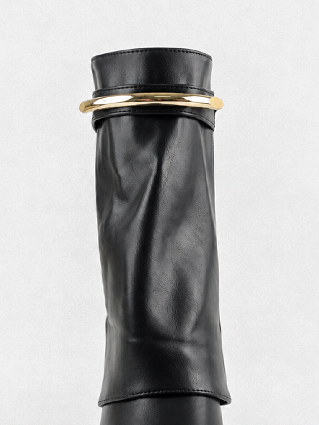 Black fold-over gold bar ankle boot faux leather – front view of the shaft