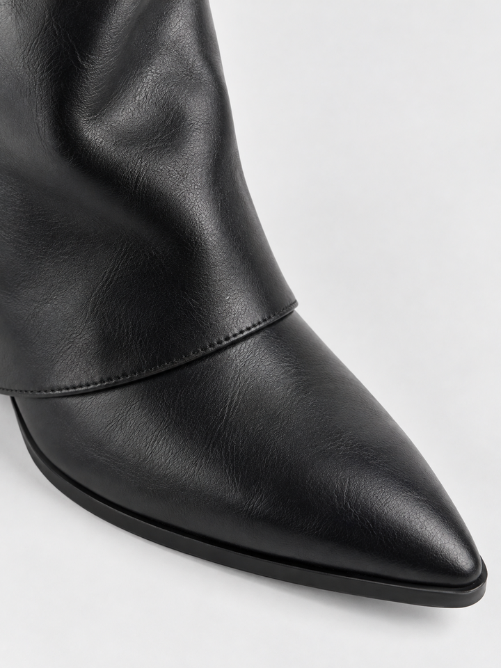Black fold-over gold bar ankle boot faux leather – pointed toe close-up