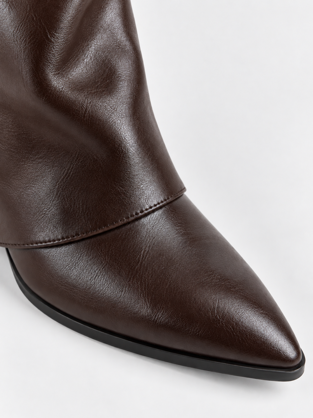 Brown fold-over gold bar ankle boot faux leather – pointed toe close-up