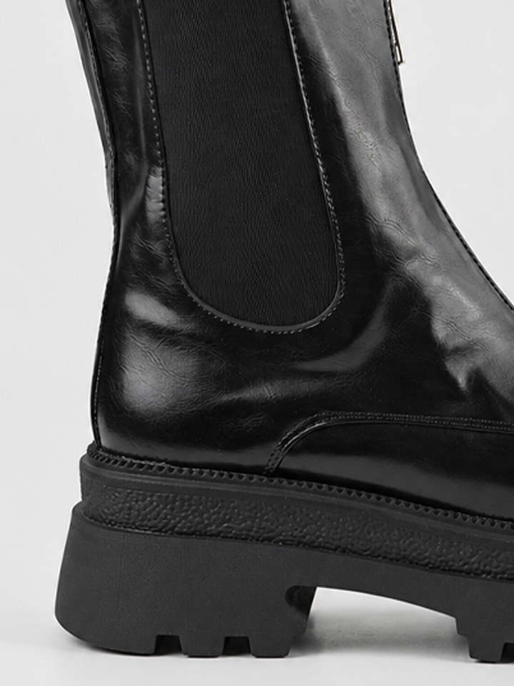 Black front-zip platform chelsea boot faux leather – elastic panel and lug sole close-up