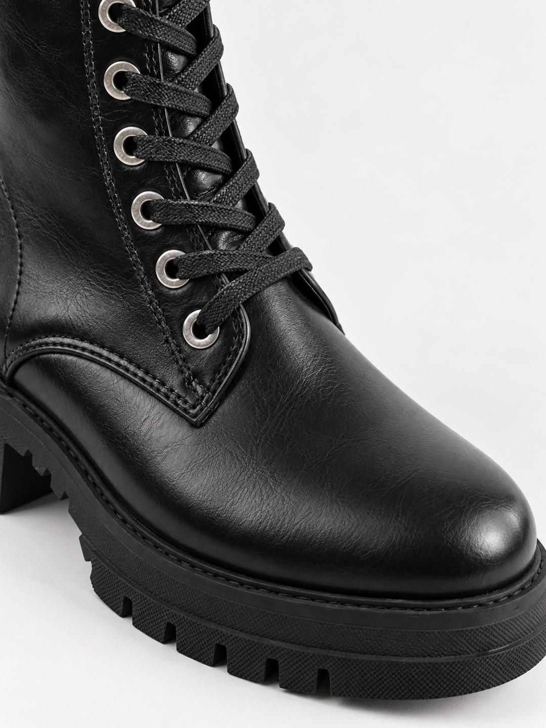 Black mid-calf lace-up combat boot faux leather – round toe close-up
