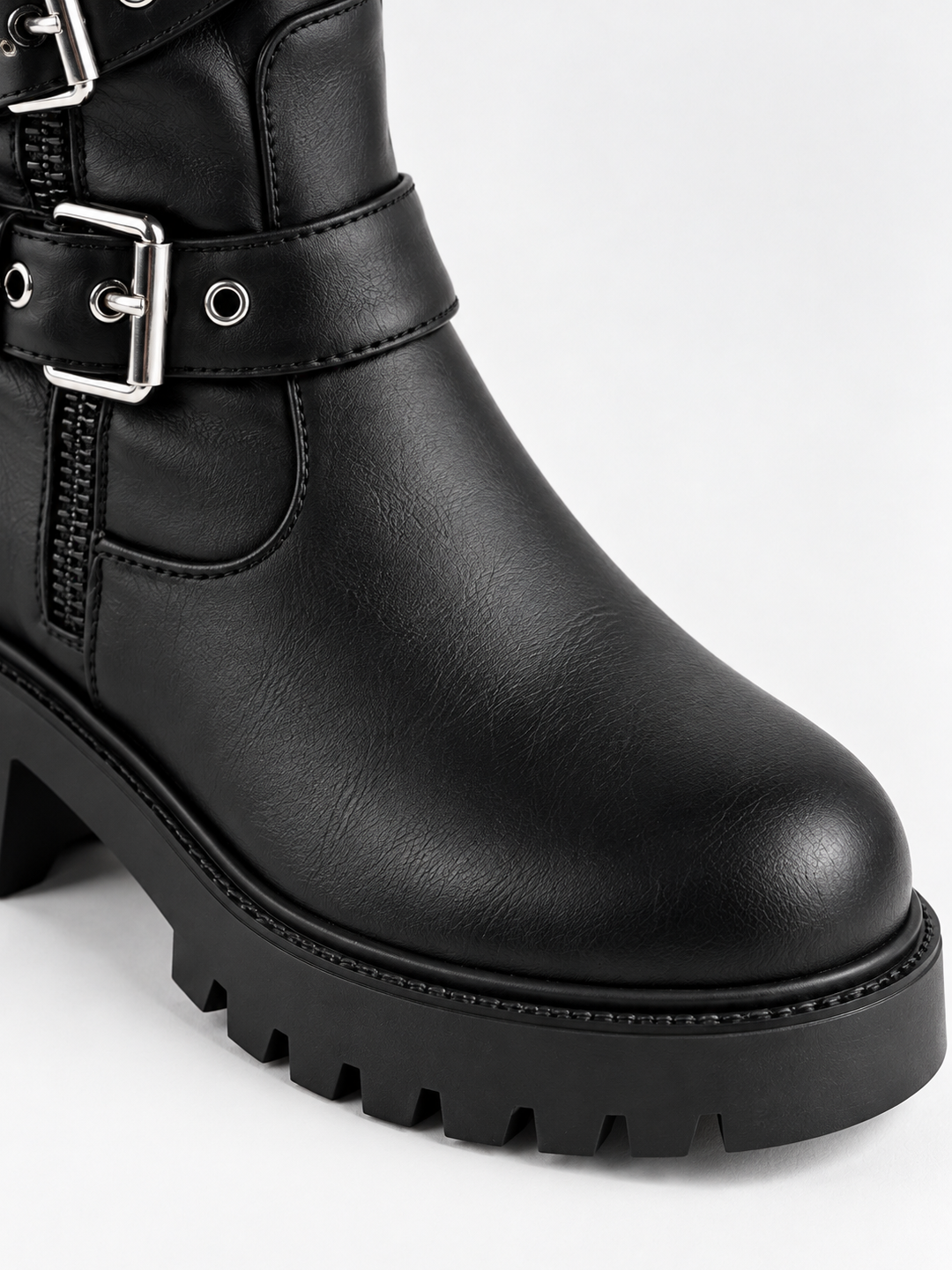 Black multi-buckle knee-high boot faux leather – round toe and lug sole close-up