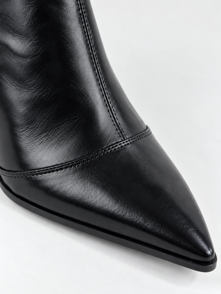 Black pointed-toe block heel mid-calf boot faux leather – pointed toe close-up