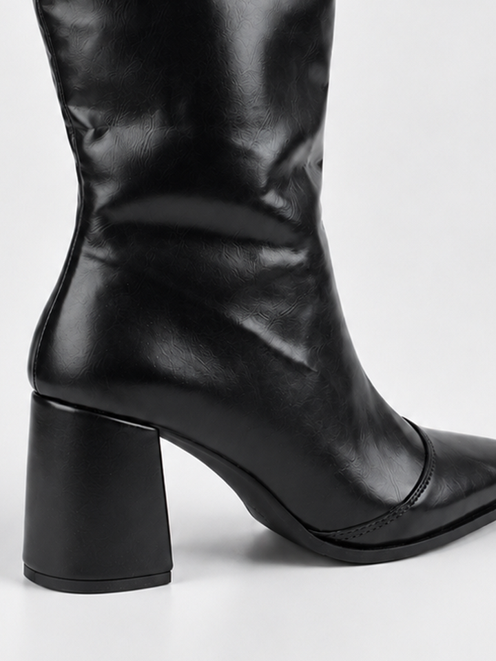 Black pointed-toe block heel mid-calf boot faux leather – block heel close-up