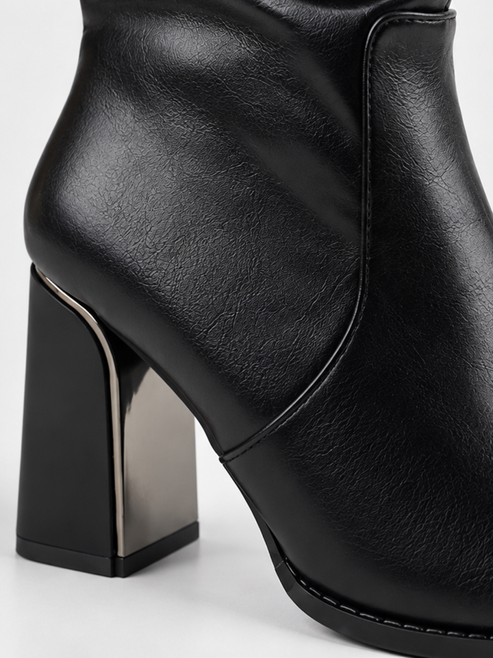 Black slouchy metal-trim block heel ankle boot faux leather – block heel close-up