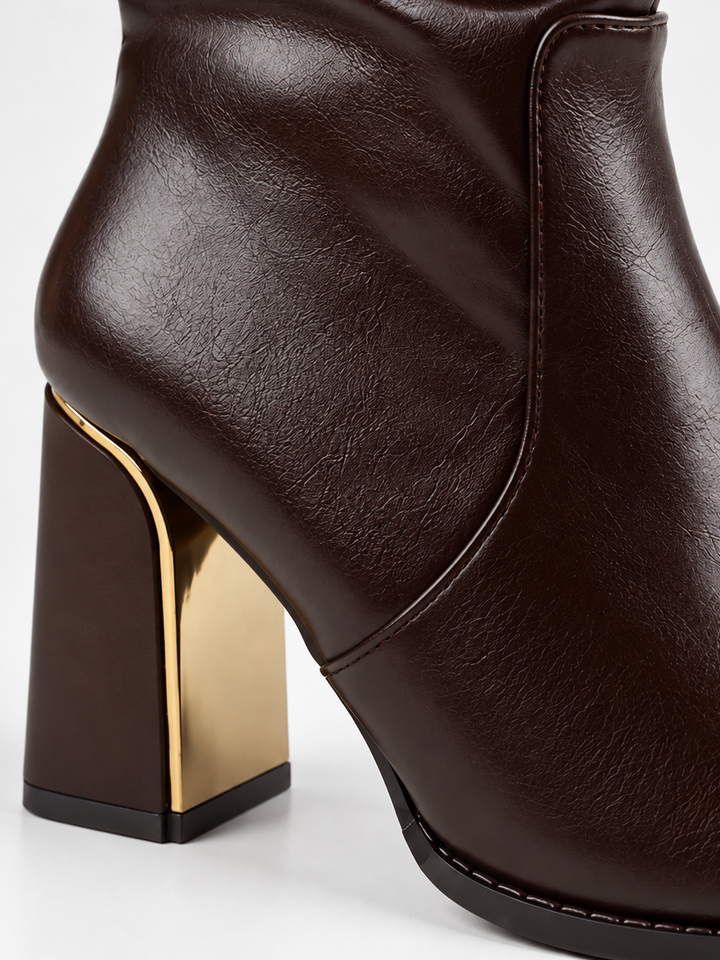 Brown slouchy metal-trim block heel ankle boot faux leather – block heel close-up