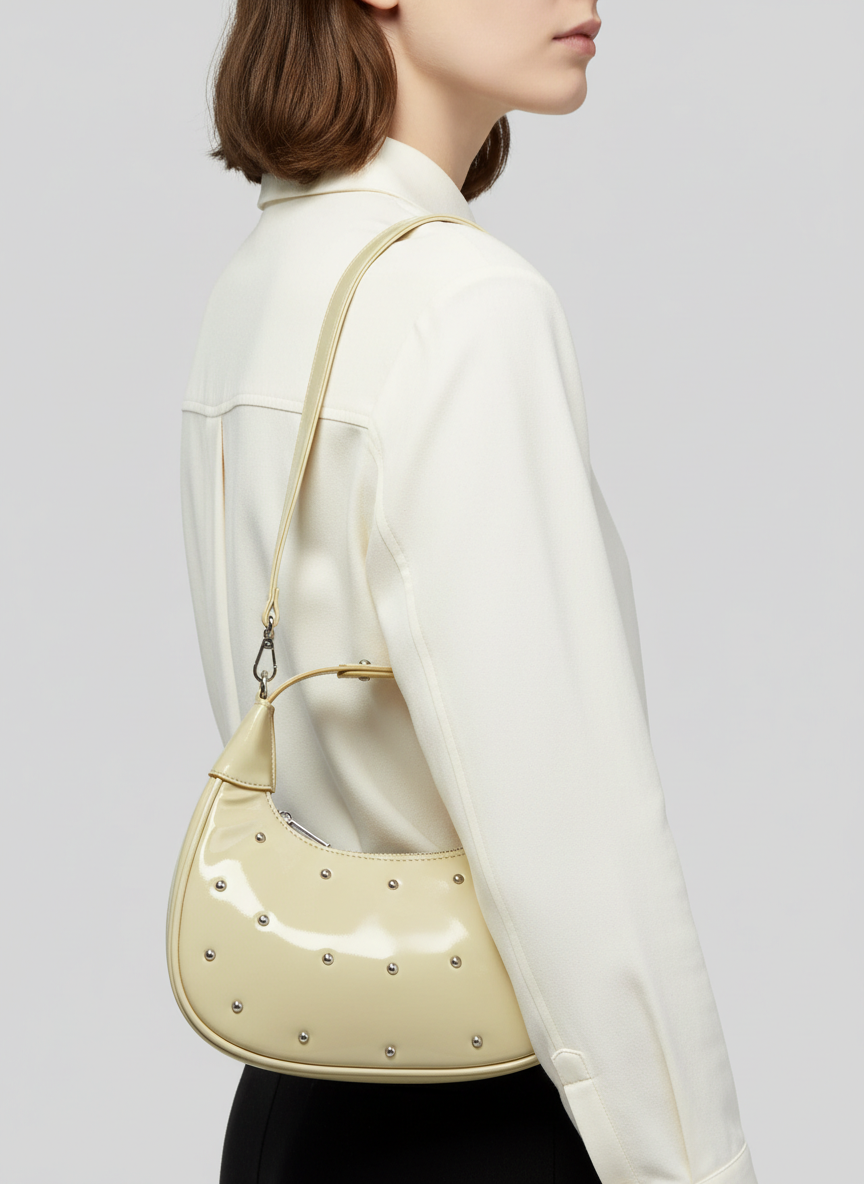 The Ivory Nova Studded Shoulder Bag | light pastel yellow