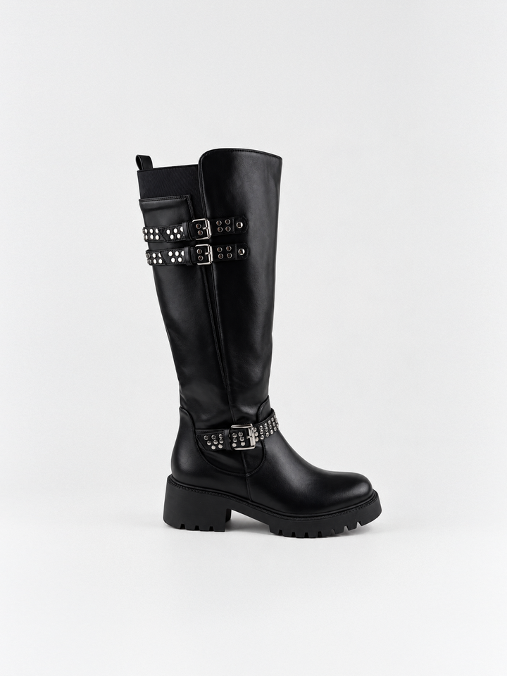 Black studded strap knee-high riding boot faux leather – side view