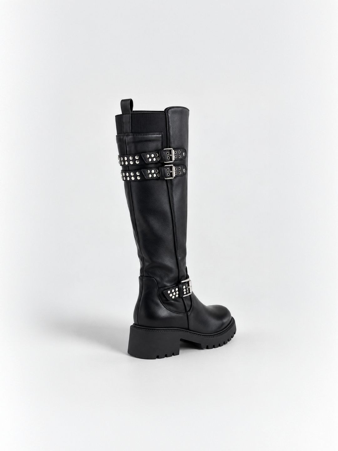 Black studded strap knee-high riding boot faux leather – back three-quarter view