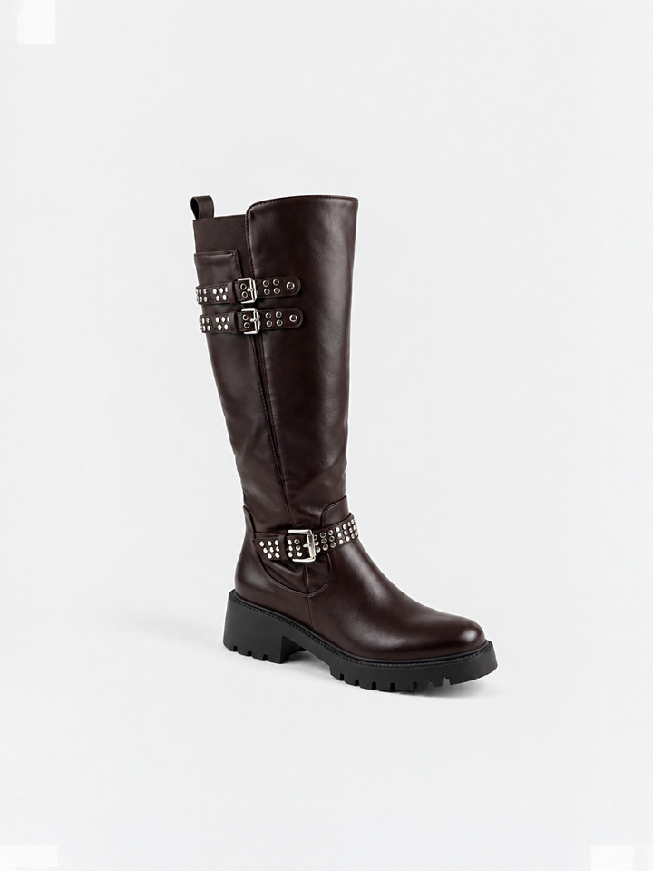 Brown studded strap knee-high riding boot faux leather – front three-quarter view