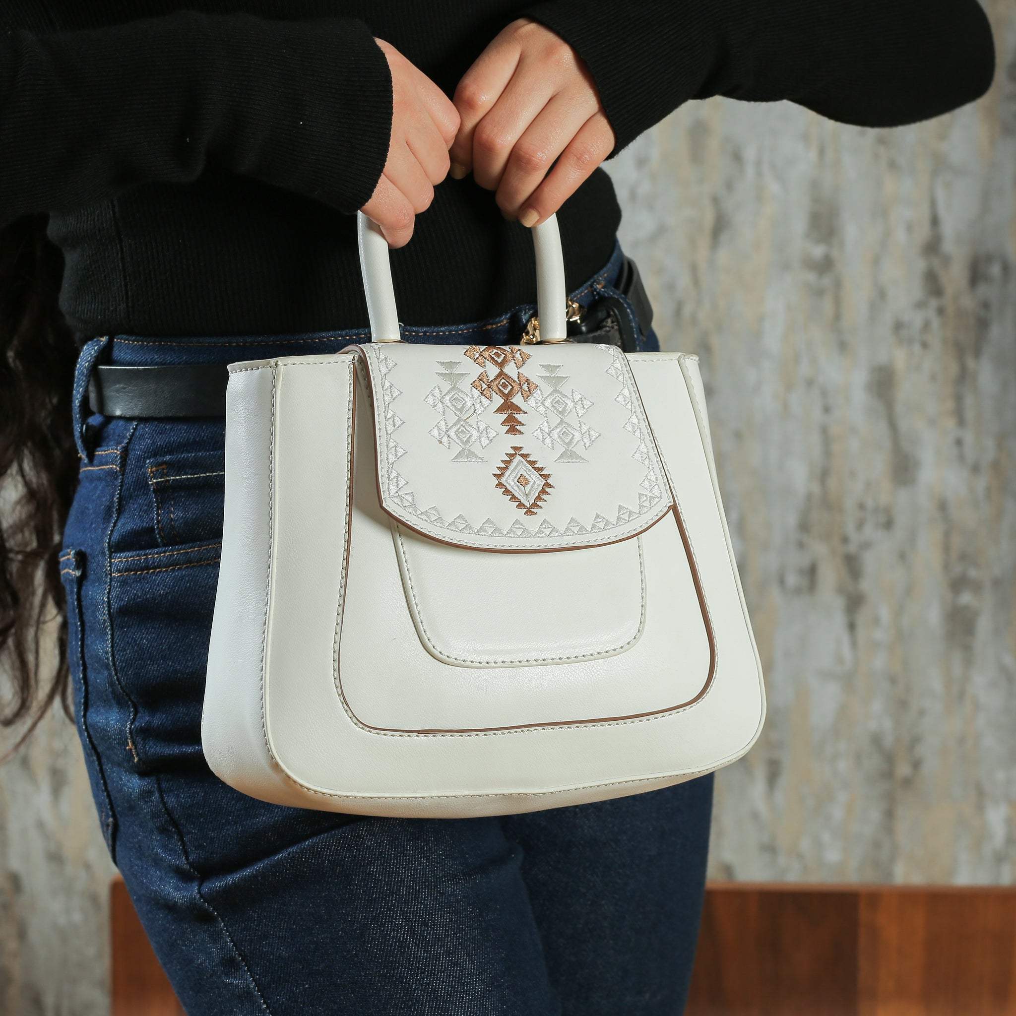 white leather bag with Geometric shapes