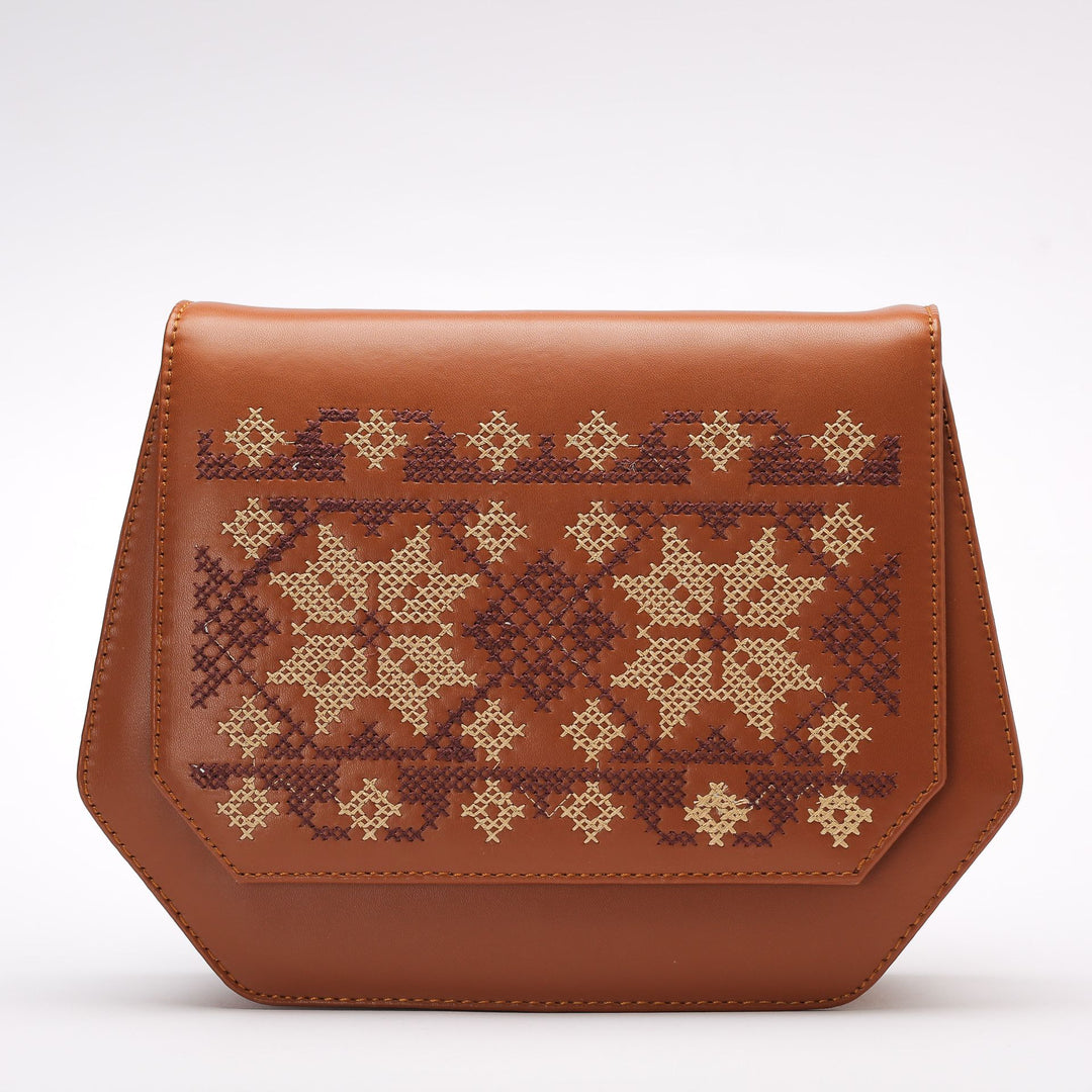 Havan Fold Up Embroidered Cross Leather Bag