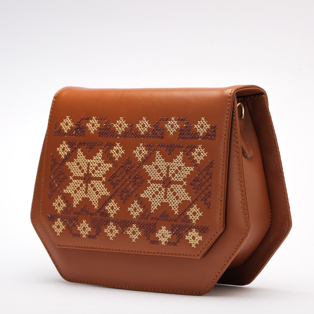 Havan Fold Up Embroidered Cross Leather Bag